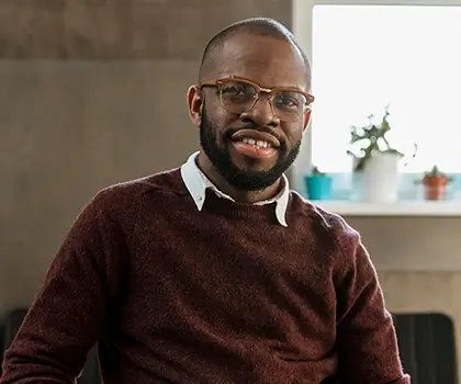 Photo of a business man sitting